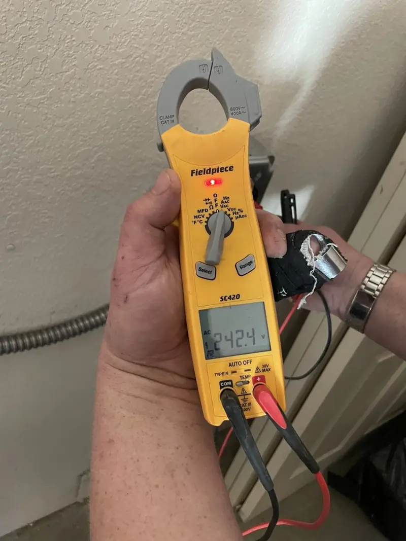 Voltage testing with clamp meter during Circuit Breaker Repair in New Brighton